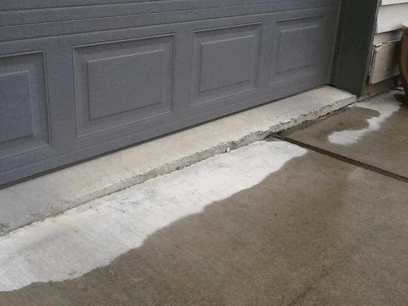 A two inch drop from the garage to the driveway