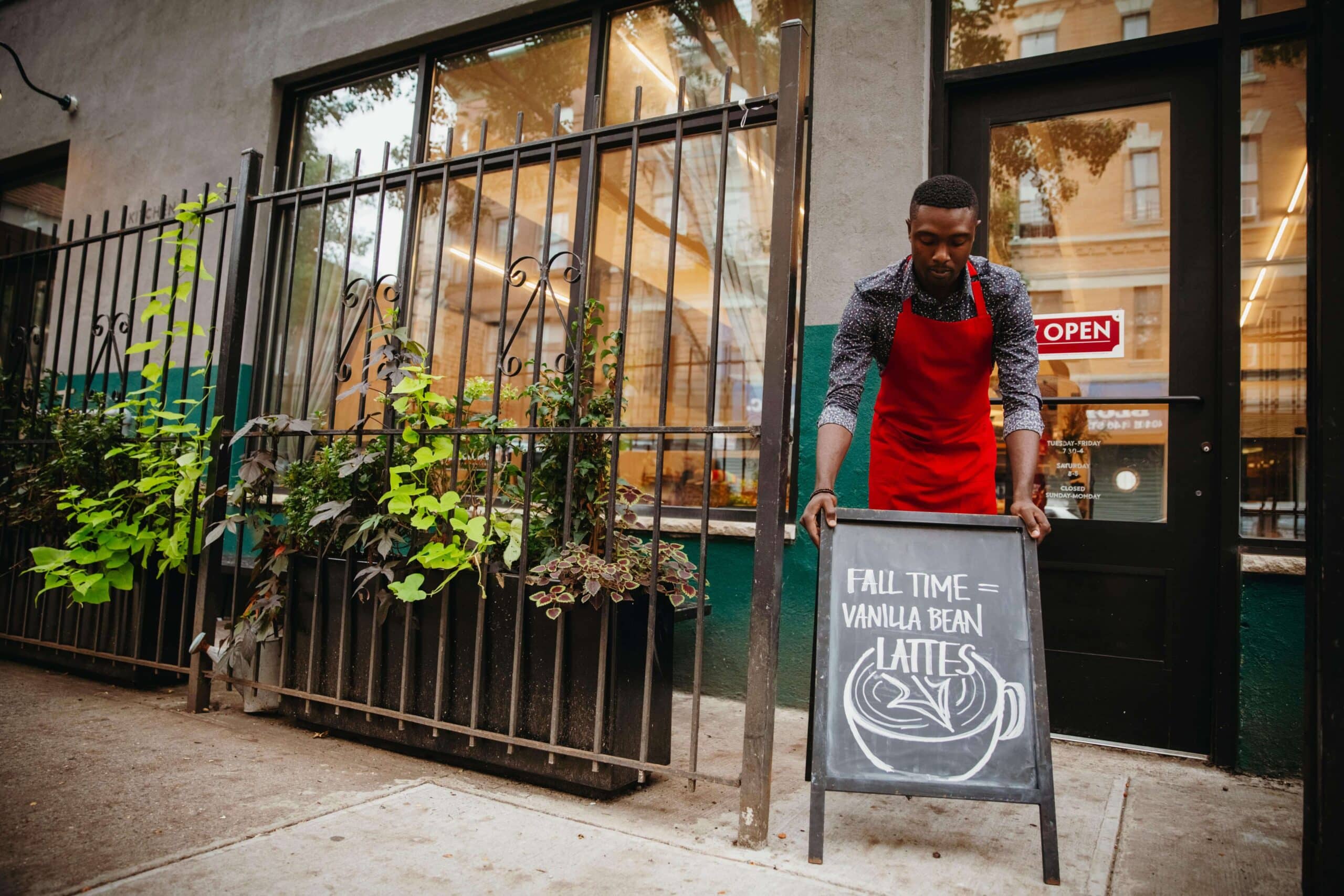 Business storefront with level sidewalk in front of it.